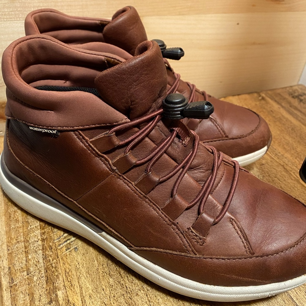Check out these stylish deep red, waterproof, high top casual shoe.  Size 8